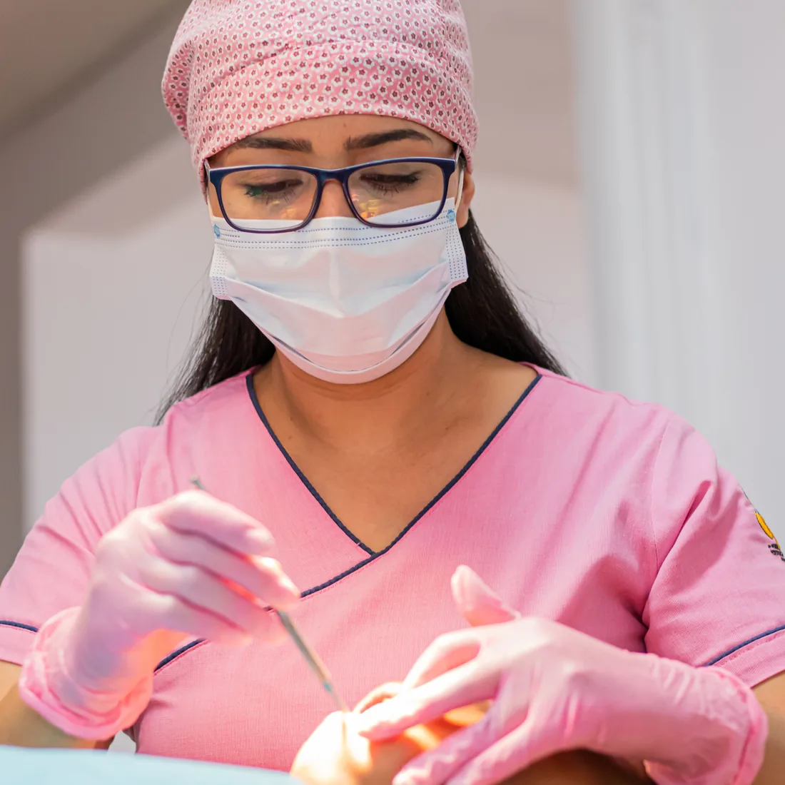Clinician treating a patient in a specialist clinic